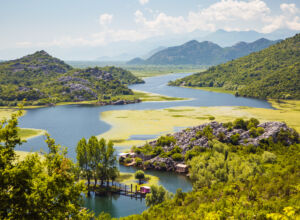 perfect summer scene of the fishermen settlement karuc. skadar lake national park, montenegro, europe.